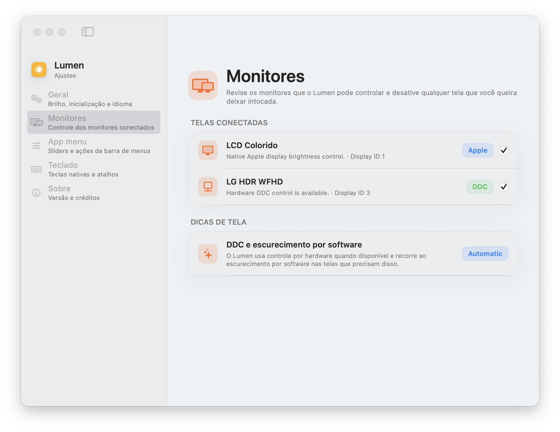 Captura real das configurações de Monitores do Lumen, com telas Apple, DDC e escurecimento por software